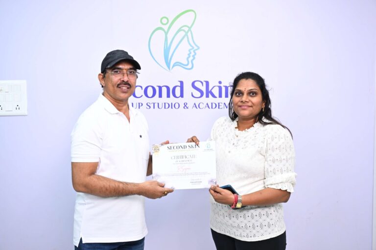 Makeup course graduate receiving an international certificate at Second Skin Makeup Academy in Punjagutta, Hyderabad