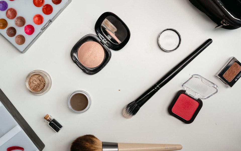 Professional makeup kit and brushes used in bridal makeup training